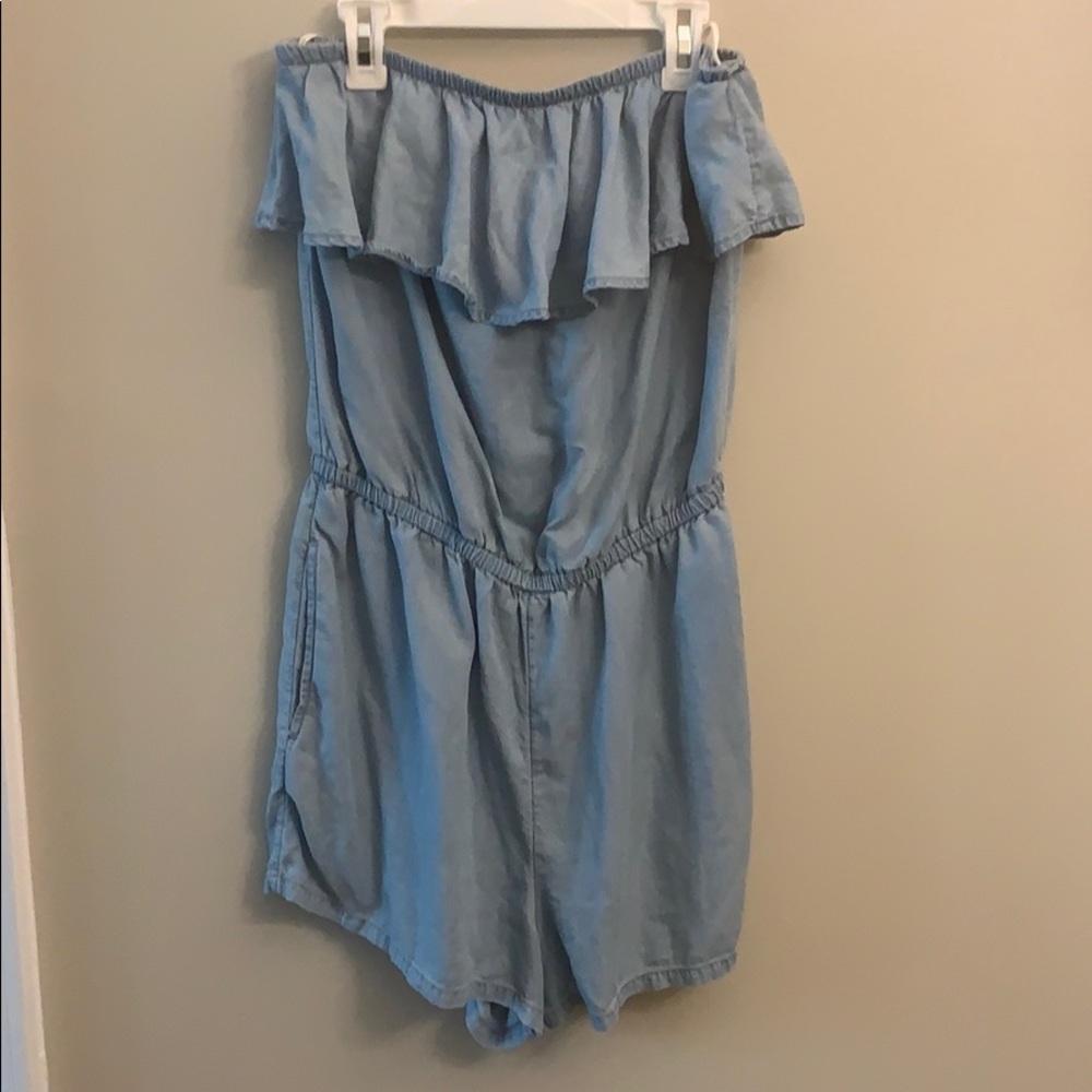 Light blue never worn Romper with pockets